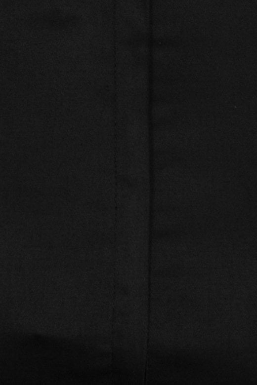 Close up of the seams of the black Bettina Skirt