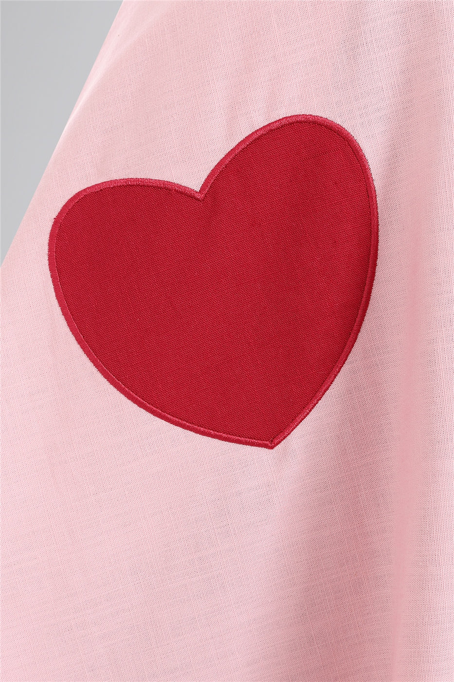 Close up of the red heart motif