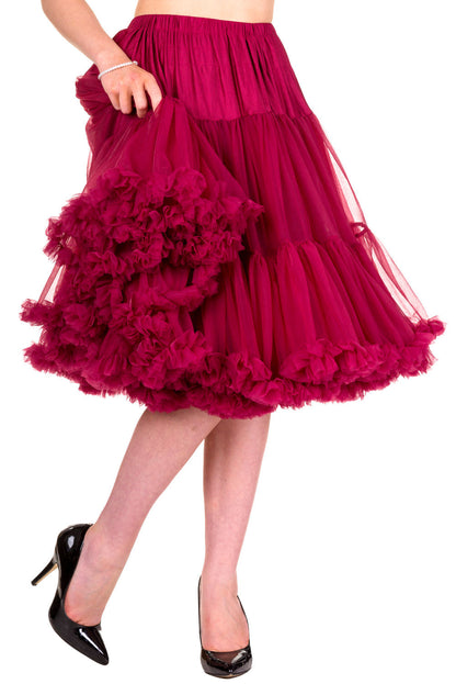 Burgundy Petticoat worn by model wearing black high heels