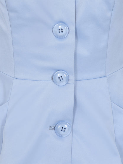 Closeup of the light blue front buttons on the Zarah Swing Trench Coat by Collectif