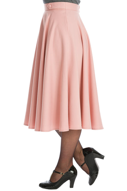 Side profile of model wearing the pink Di Di Swing Skirt 
