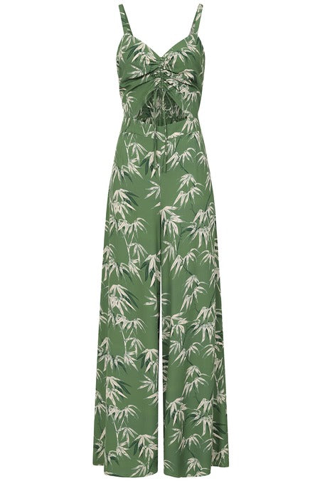Green jumpsuit with white leaf pattern on a white background