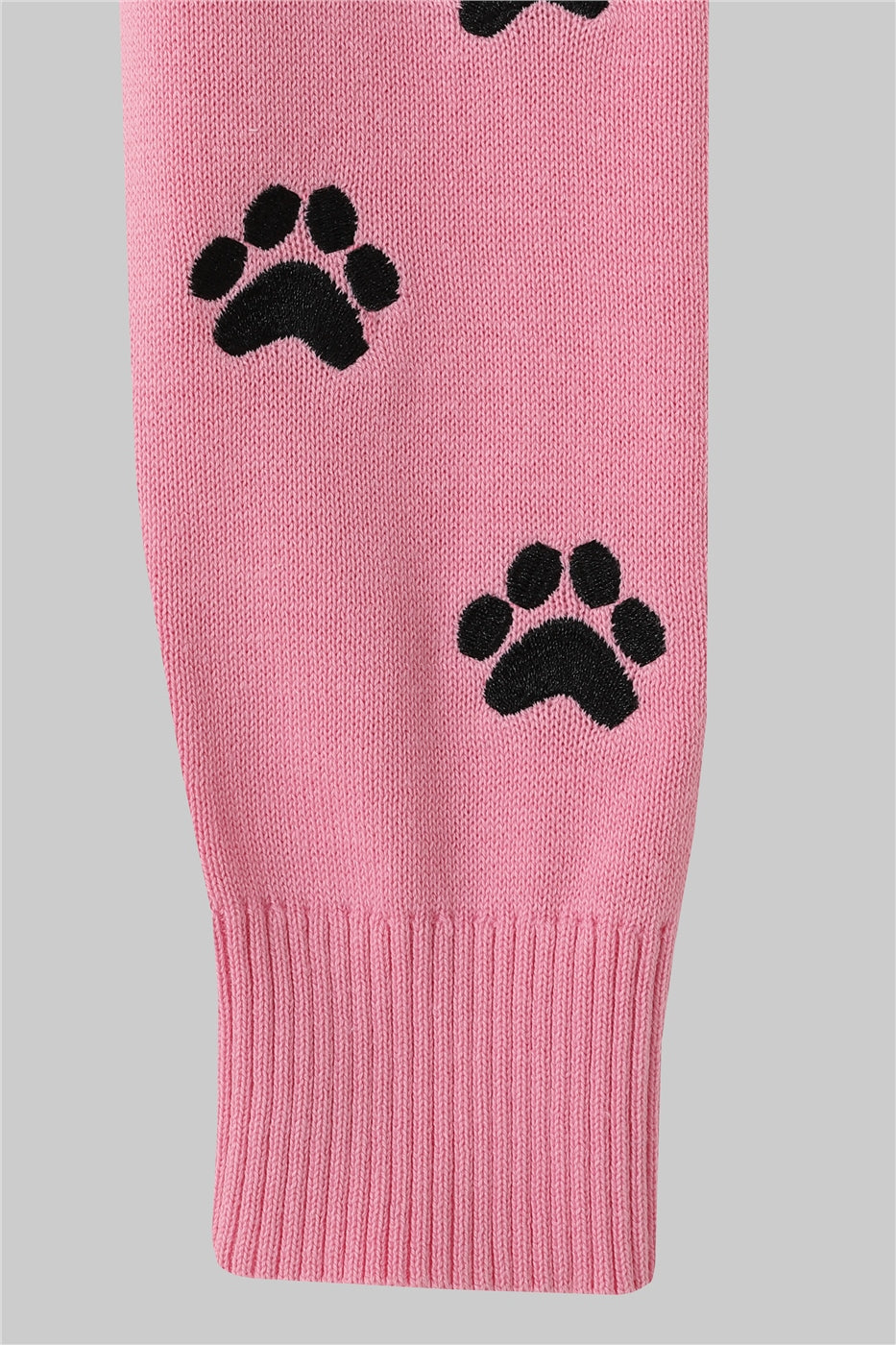 Close up of the paw print details on one sleeve 