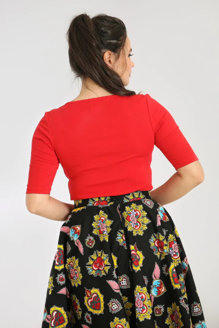 Brown haired model facing away from the camera showing the back of the Red Philippa Top