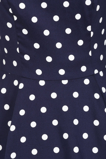 Navy blue dress with white polka dots