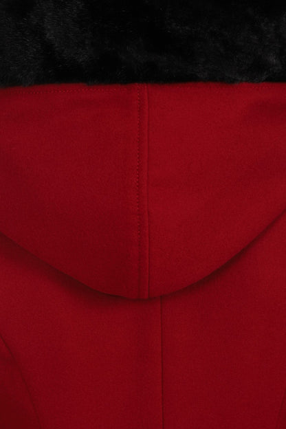 Close up showing the back of the fur trim hood on the Red Amaya Swing Coat