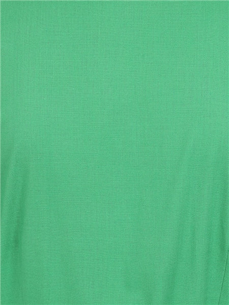 Close up of the plain green cotton blend Caterina dress  fabric 