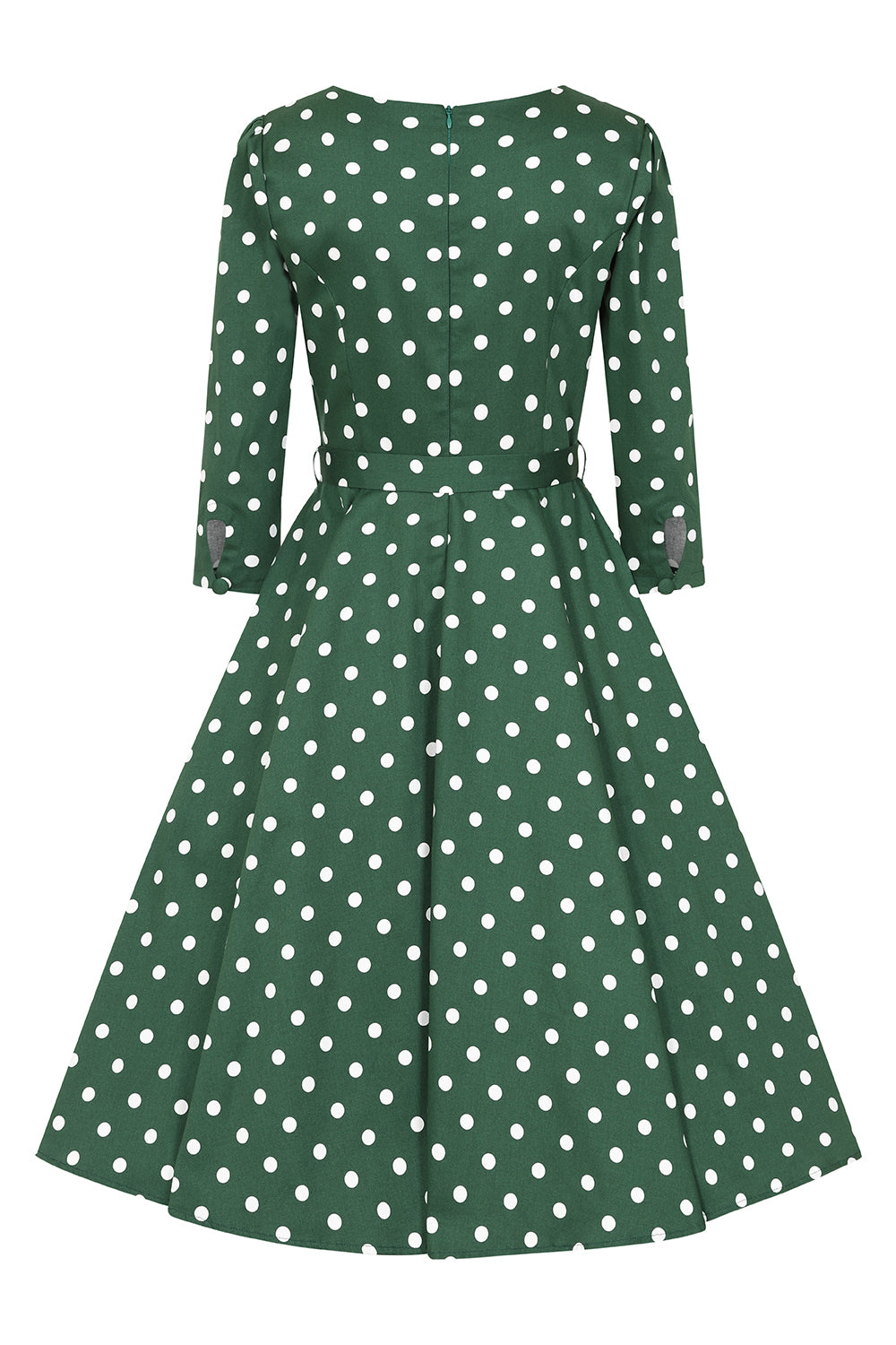 Green dress with white polka dots on a white background