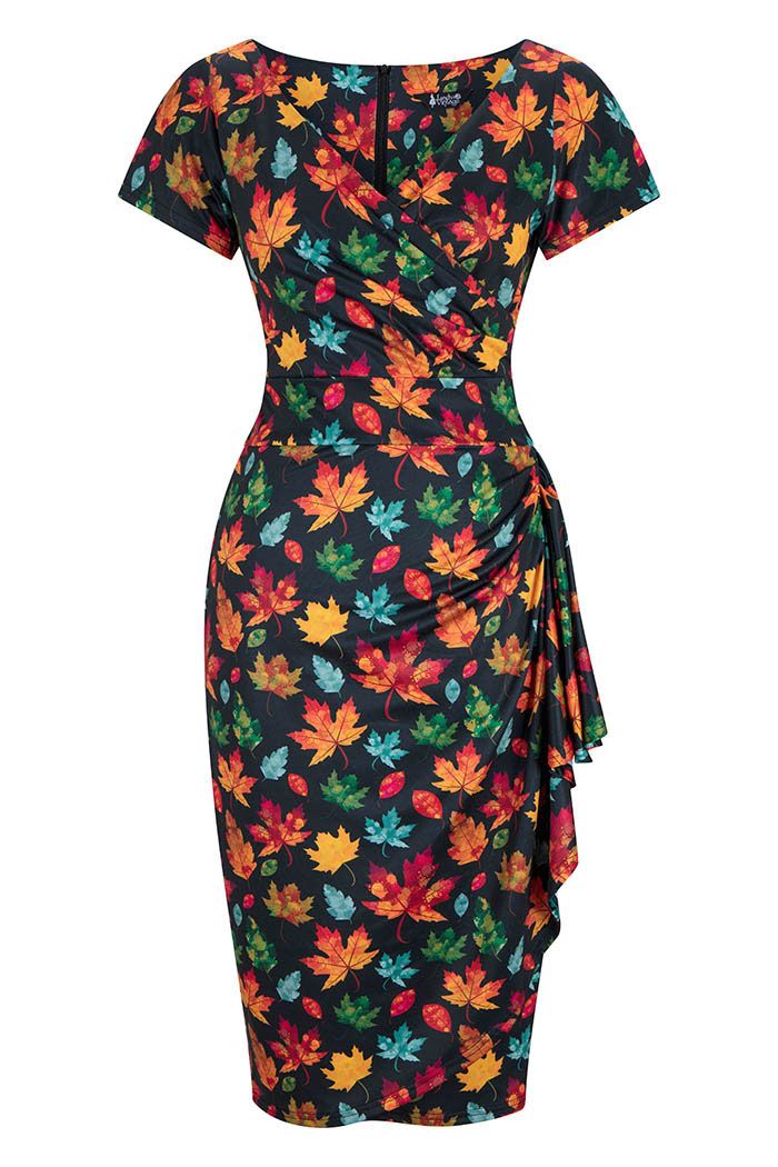 V neck wrap pencil dress on a plain white background with short sleeves, multicoloured leaf print on a black fabric and a side frill