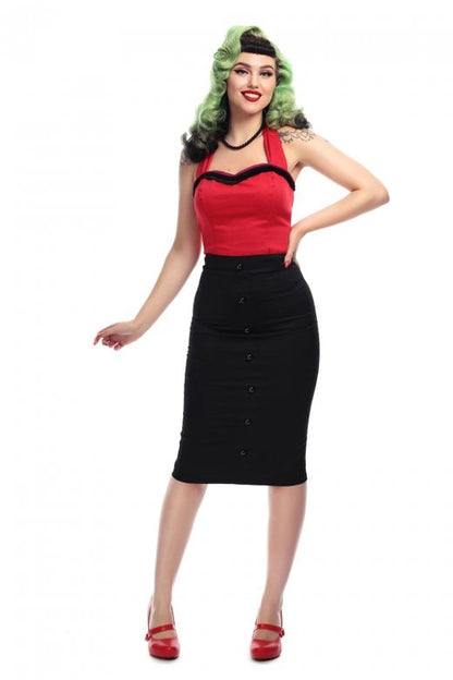 Pin up style model wearing a red halter neck top and the Bettina black pencil skirt with red strappy high heels